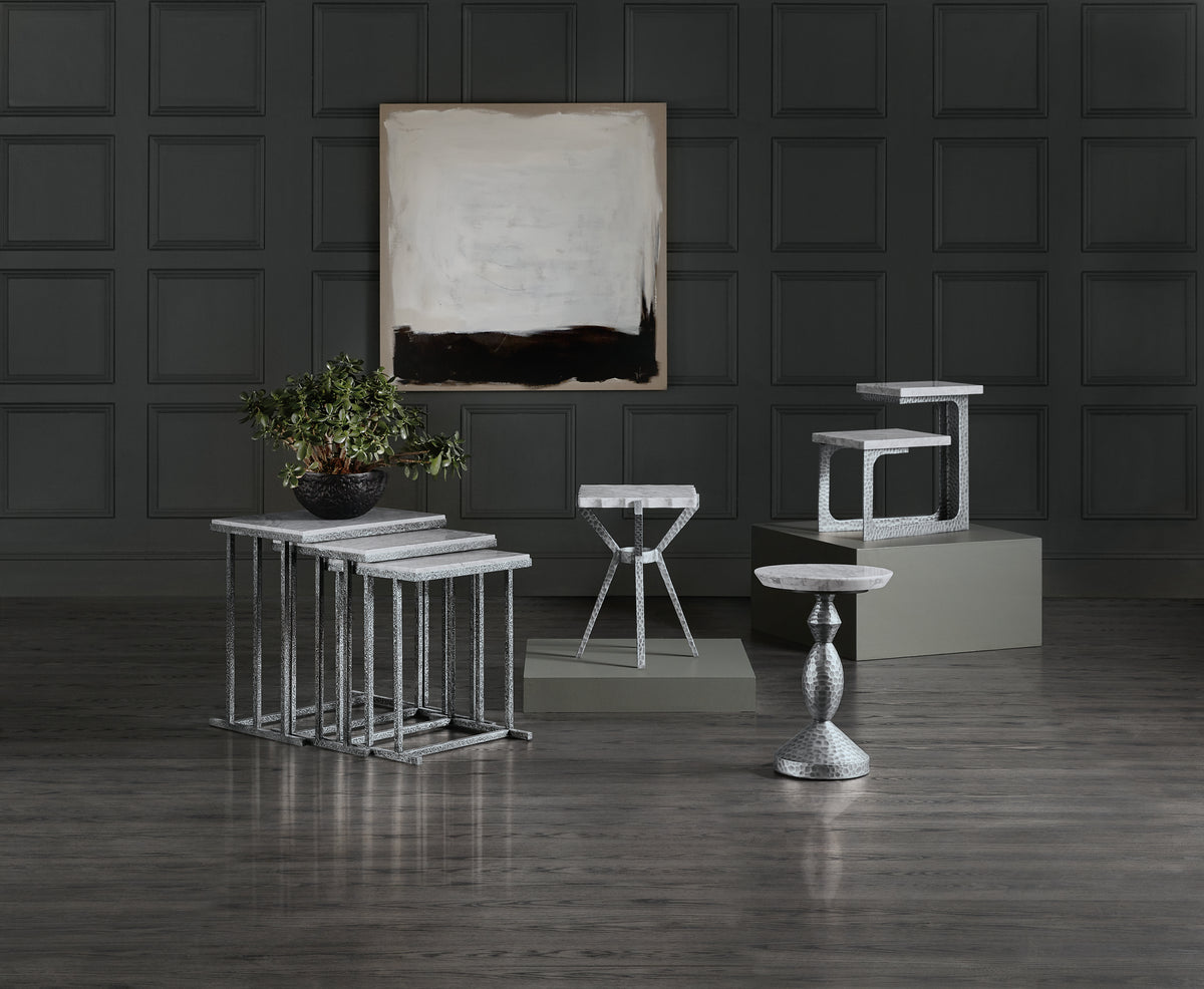 a group of stools and tables in a room