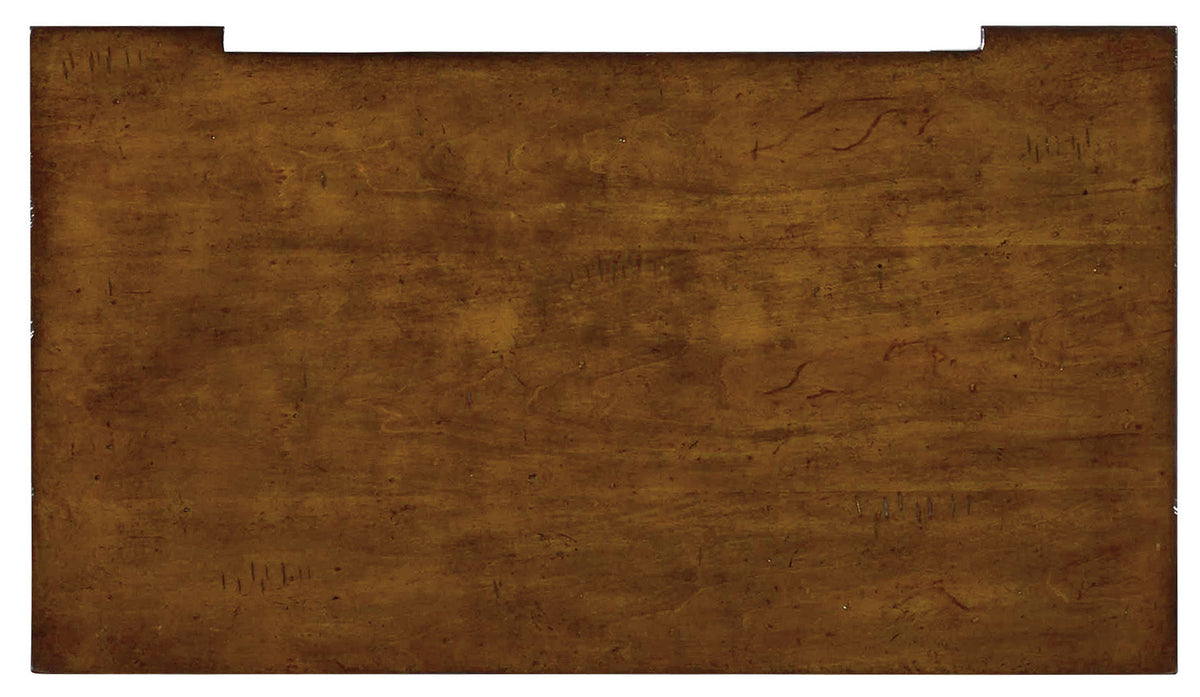a brown rectangular object with scratches