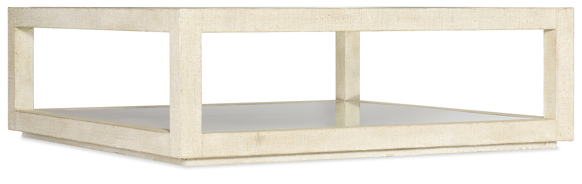 a white shelf with a mirror