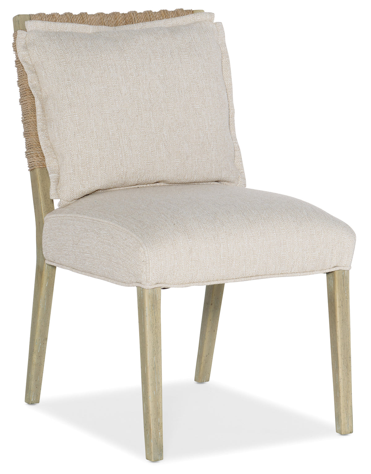 a white chair with a pillow