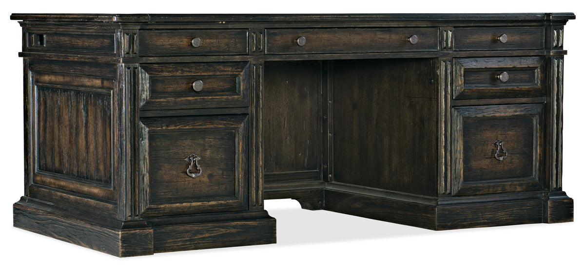 a wooden desk with drawers