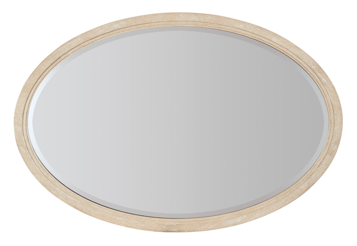 a mirror with a gold frame