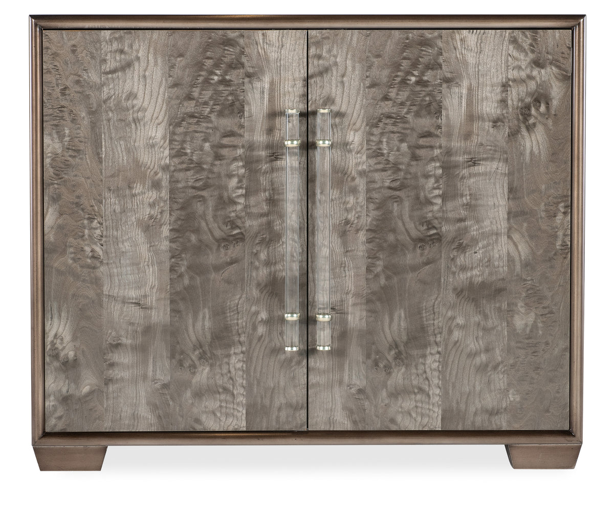 a wood cabinet with a clear handle