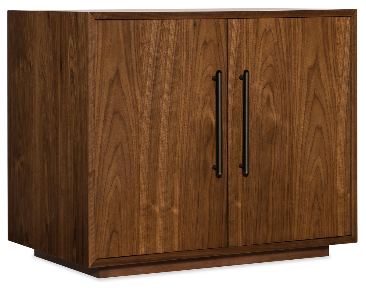 a wooden cabinet with black handles