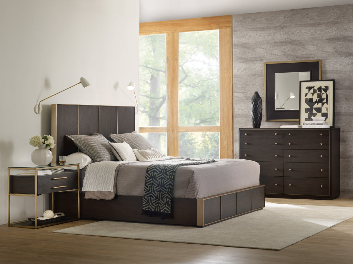 a bedroom with a bed and dresser