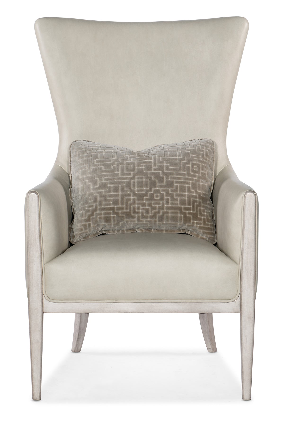 a white chair with a pillow