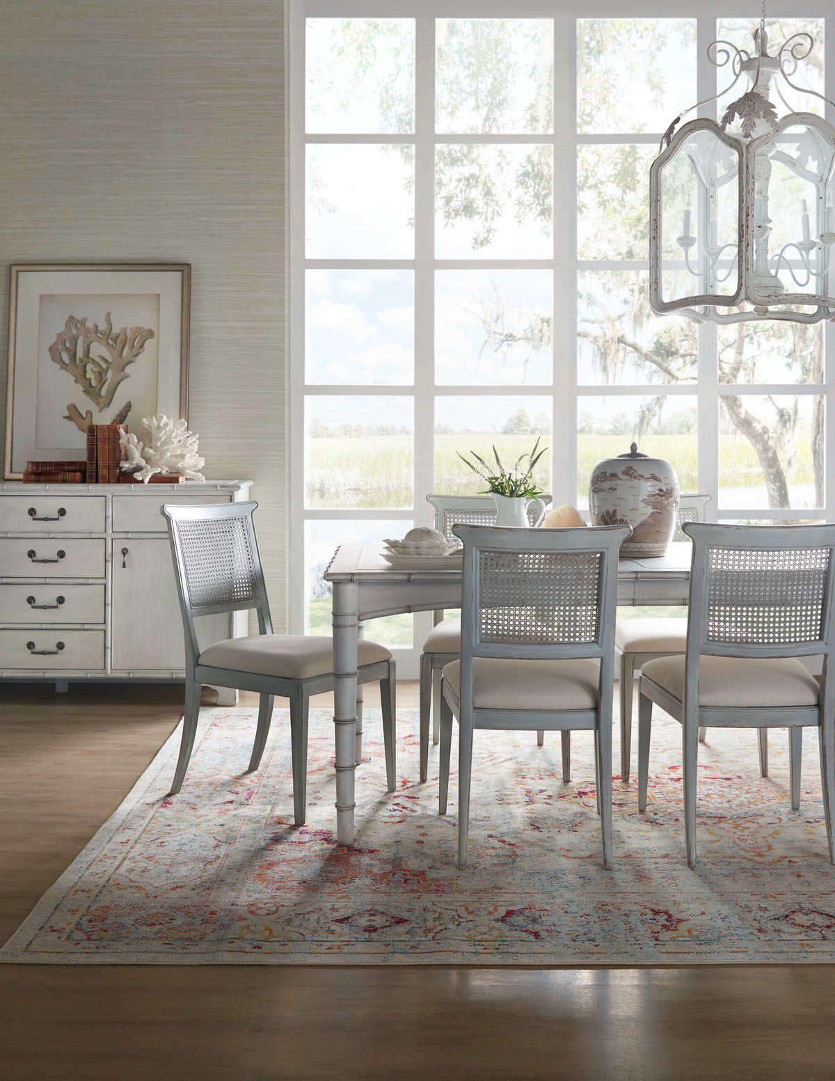 a dining room with a table and chairs