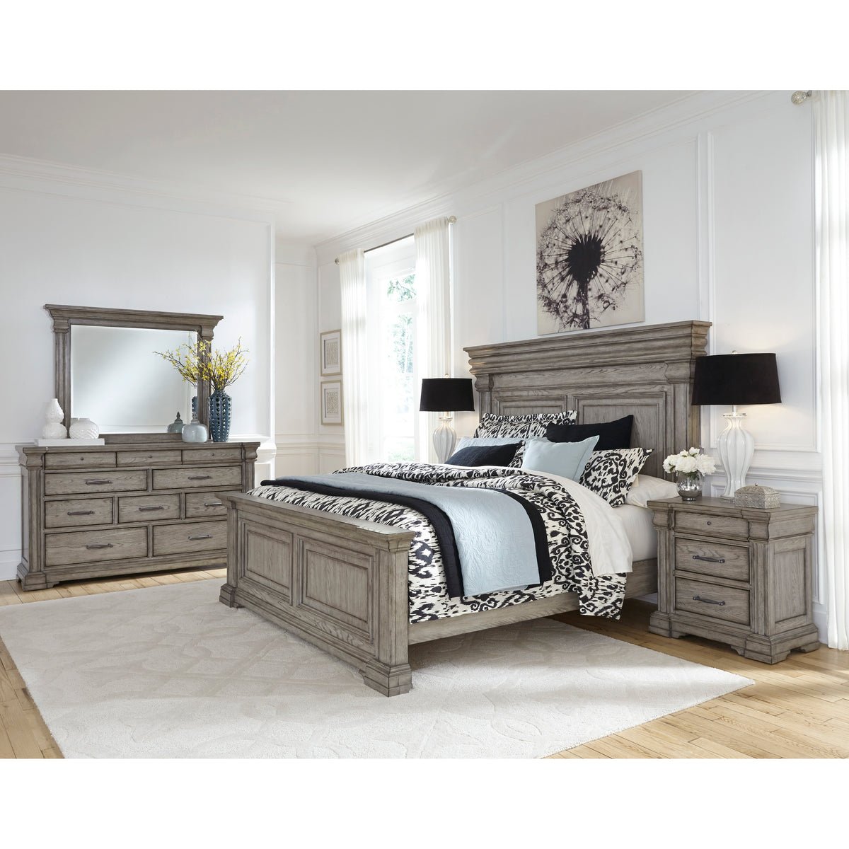 a bedroom with a bed and dresser