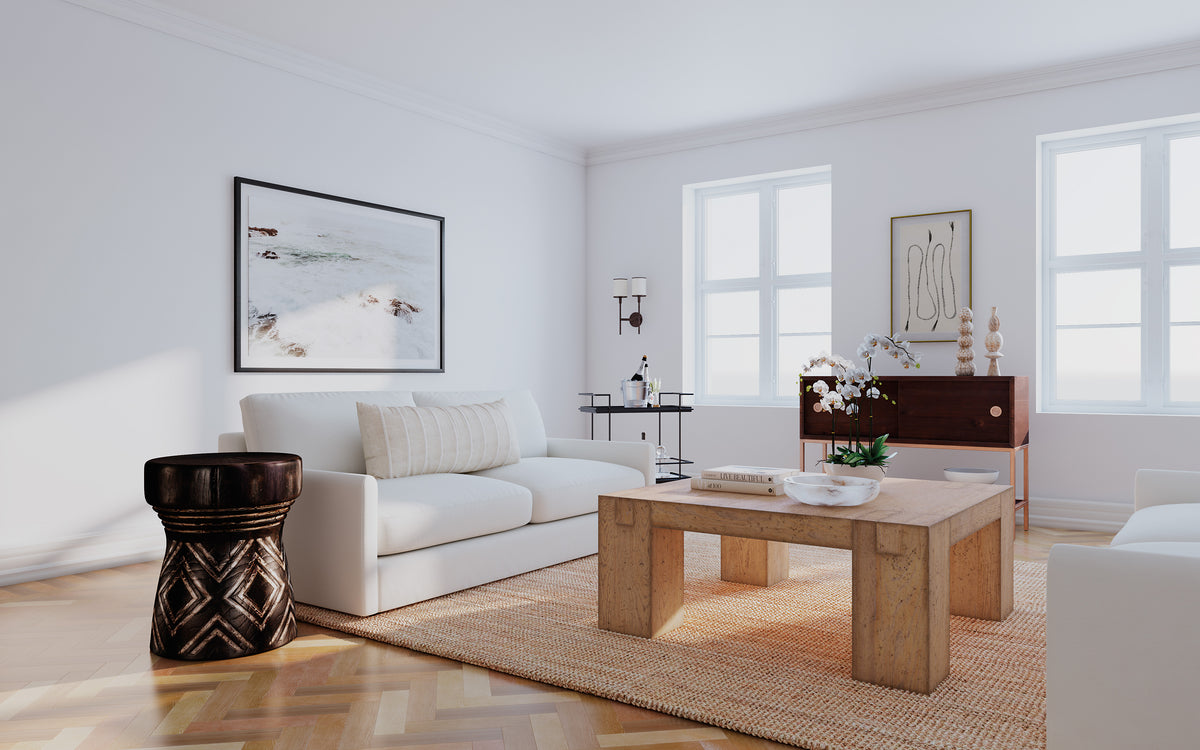 a living room with a couch and coffee table
