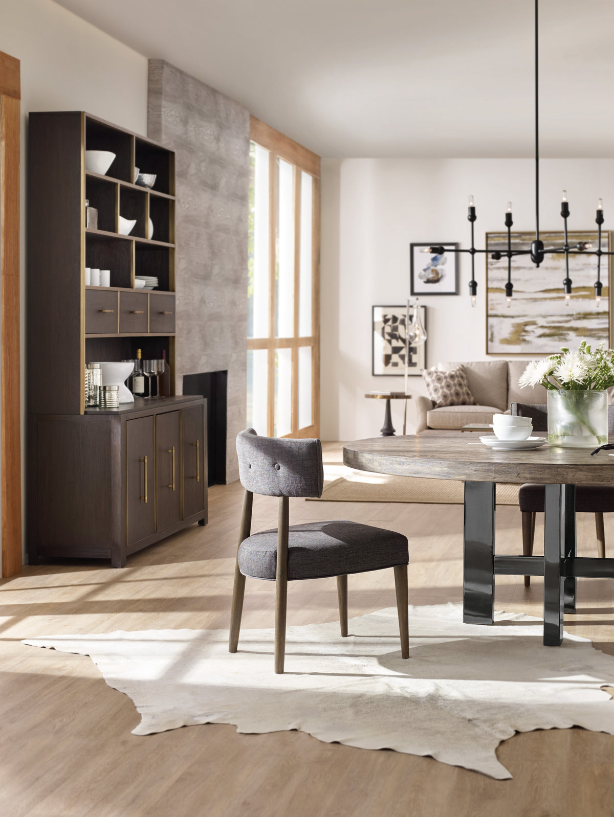 a dining room with a table and chairs