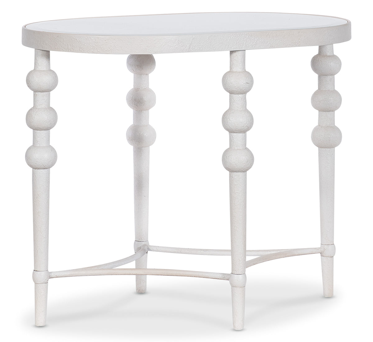 a white round table with round legs