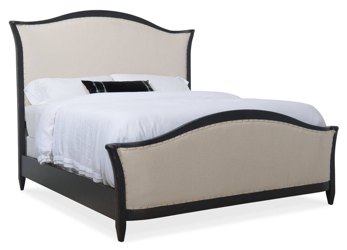 a bed with a white bedding
