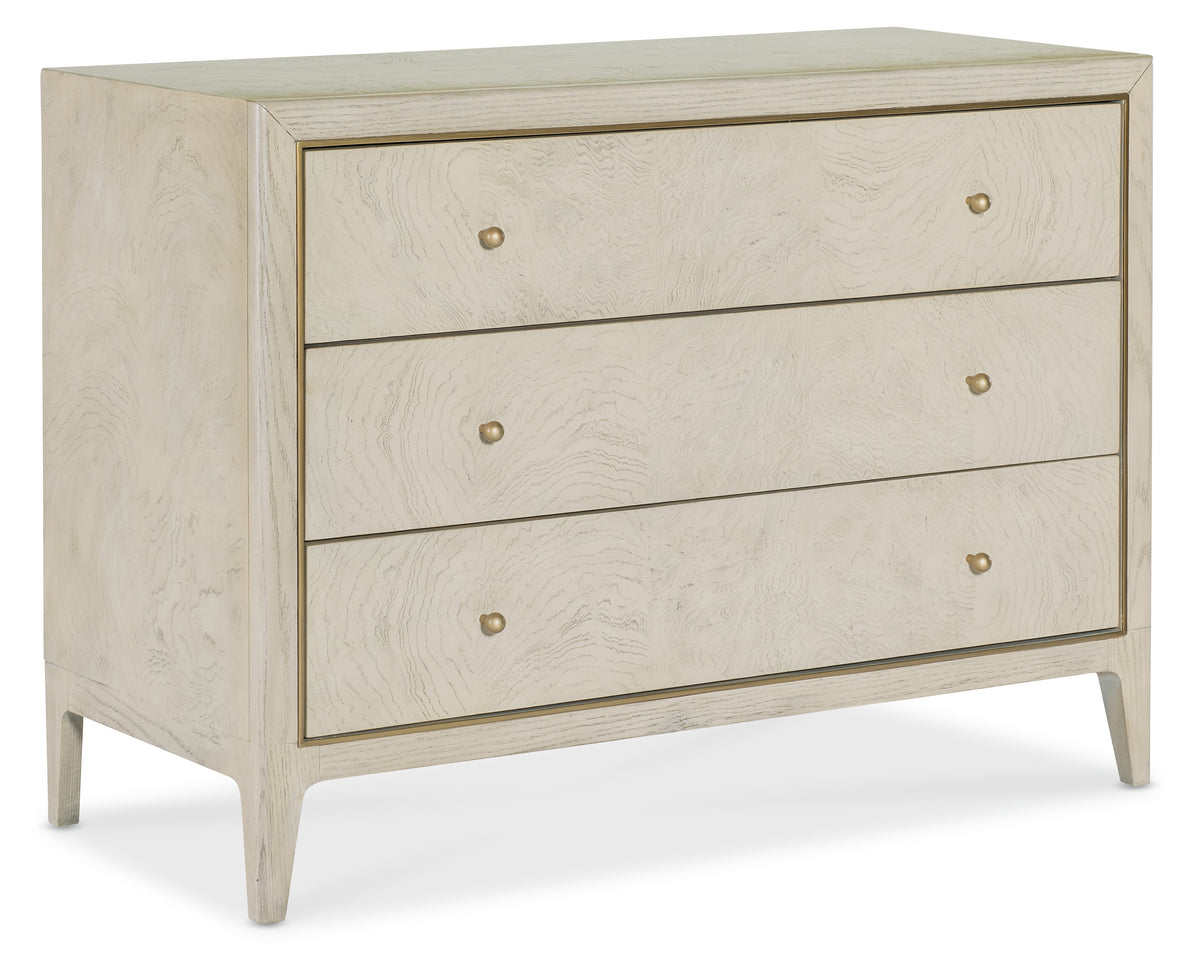 a white dresser with drawers