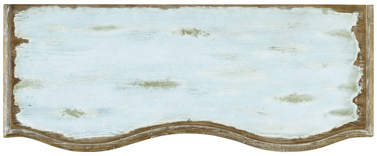 a white and blue wood sign