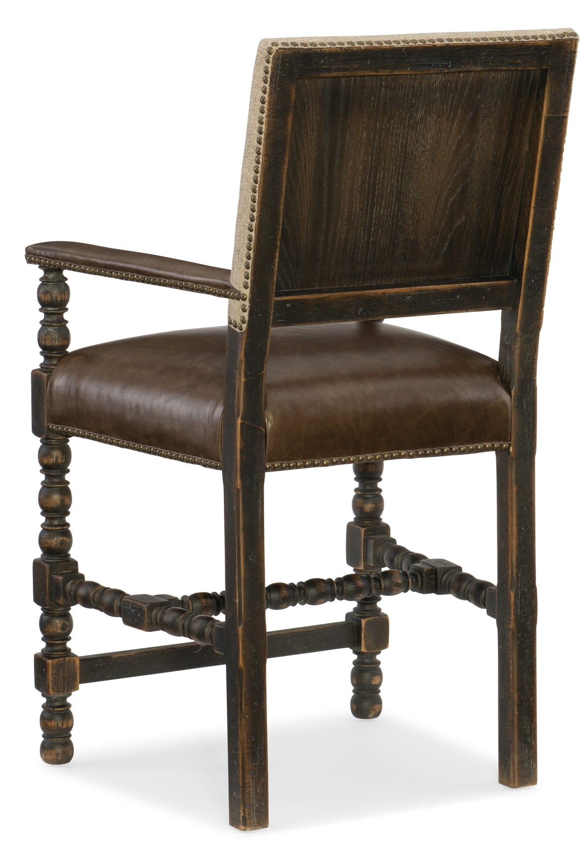a brown chair with a cushion