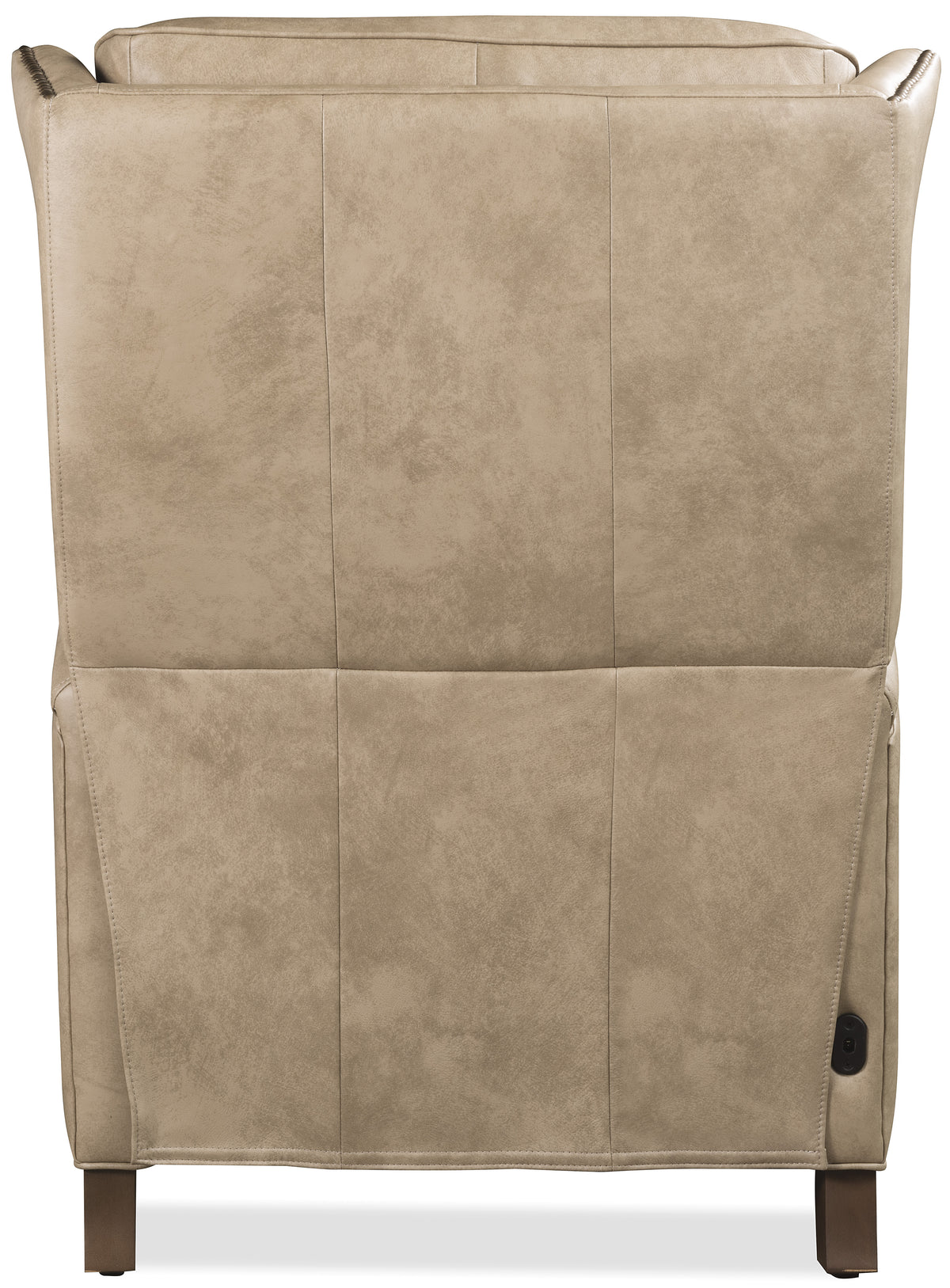 a tan leather chair with a black button