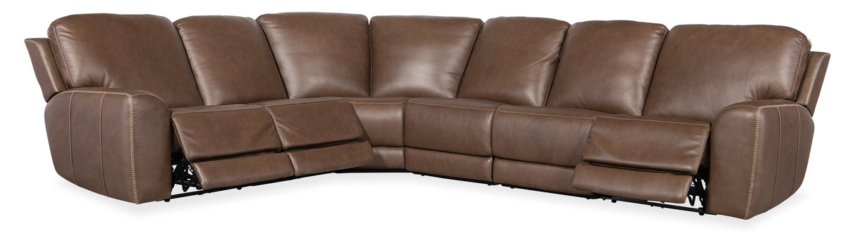 a brown leather couch with a white background