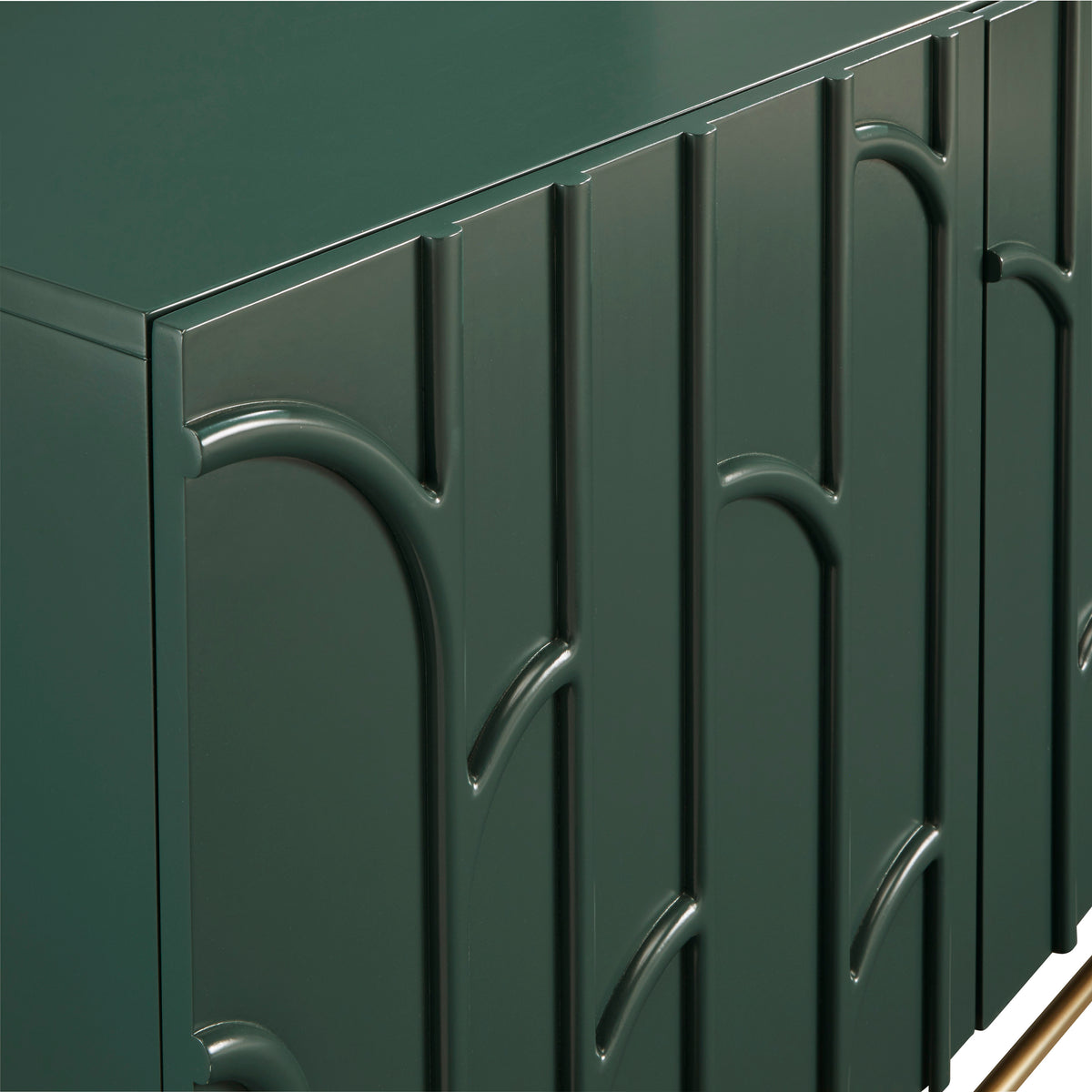 a green cabinet with gold legs
