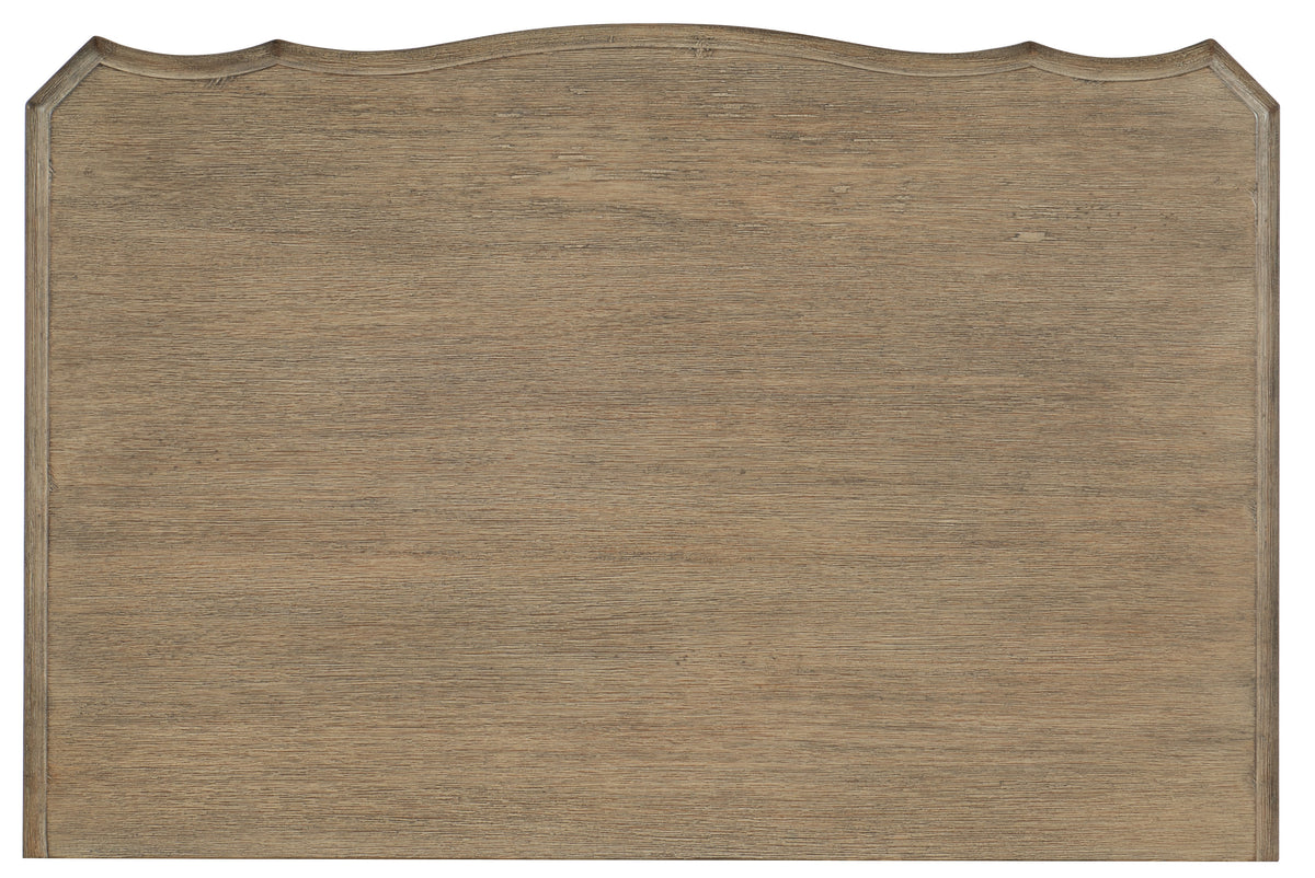 a wood sign with a curved edge