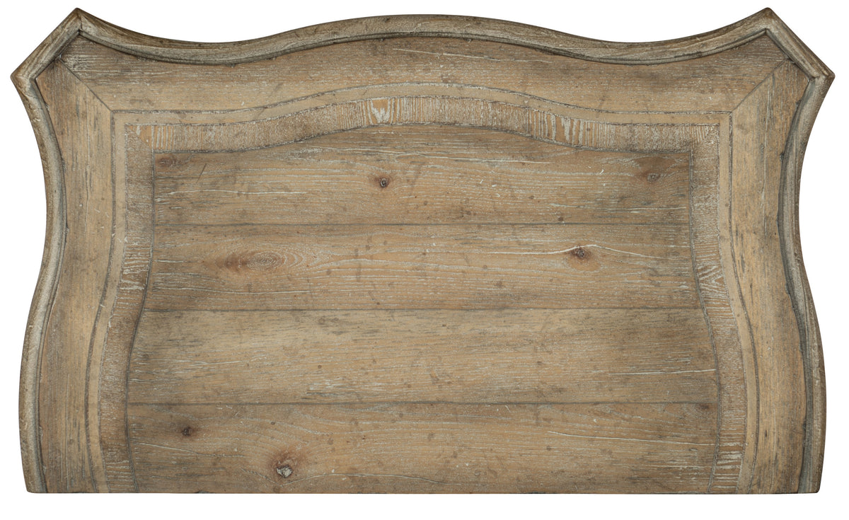 a wooden board with a curved edge