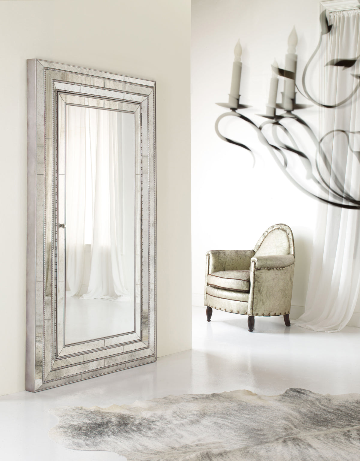 a large mirror next to a chair