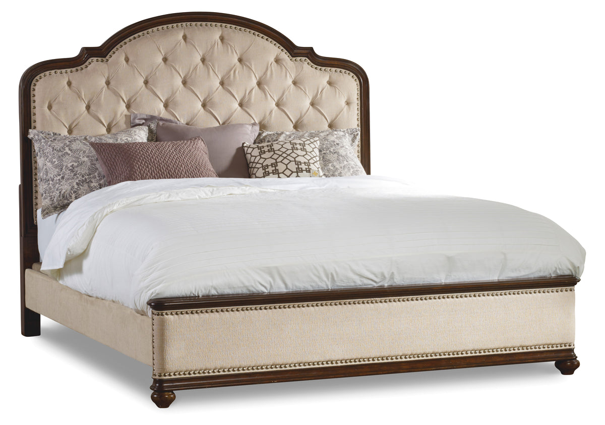 a bed with pillows on it