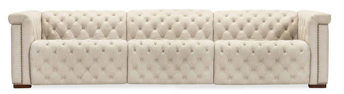 a white couch with buttons
