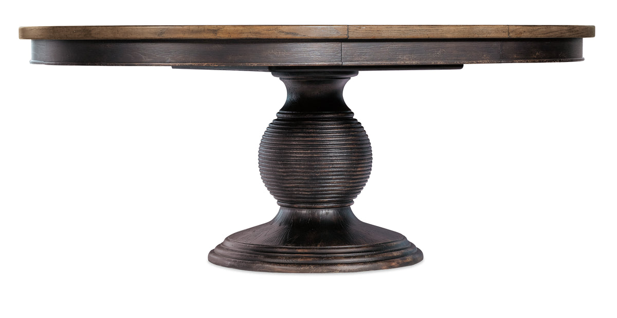 a wooden table with a round base