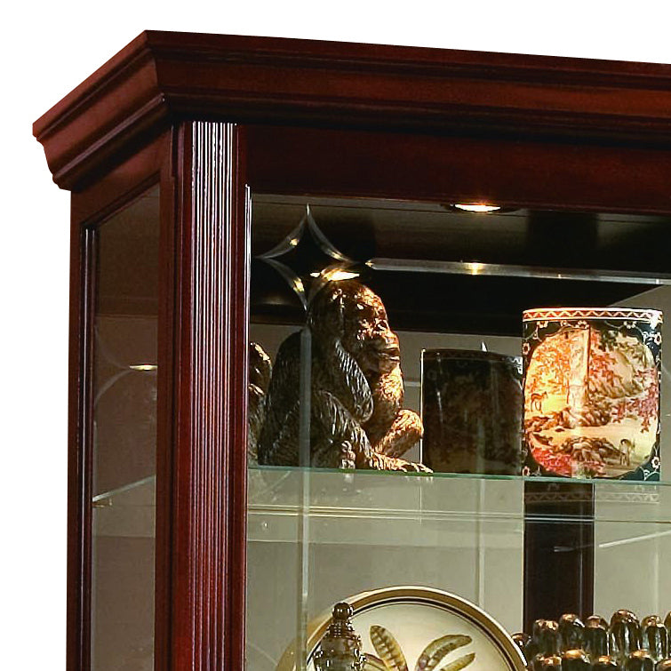 a glass cabinet with a statue and plates