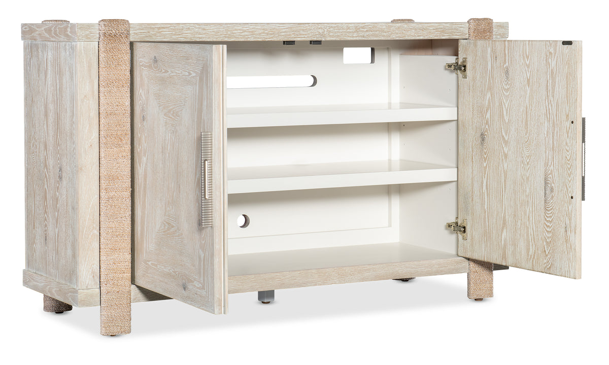 a white cabinet with shelves