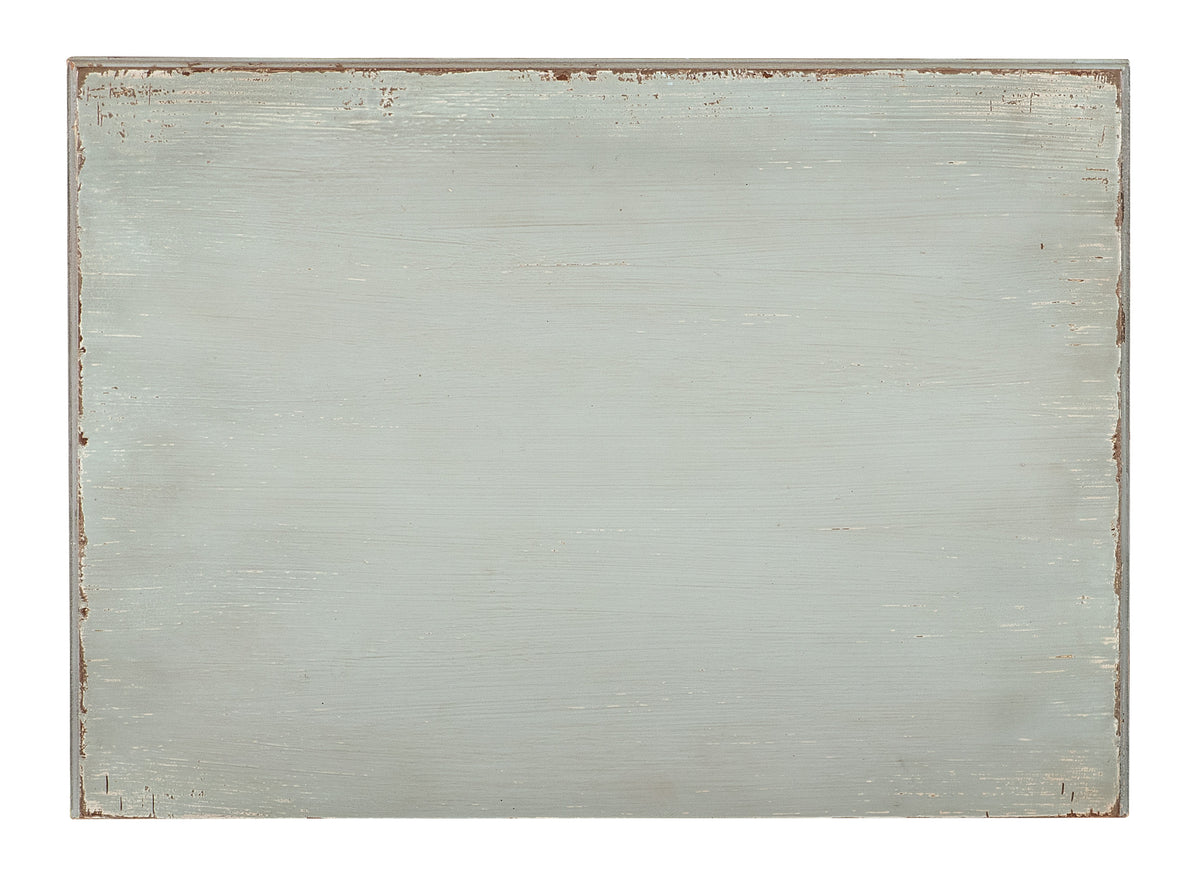 a white rectangular object with rust