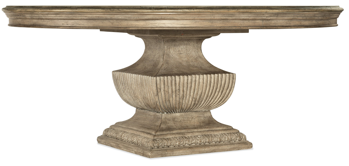 a wooden table with a carved base