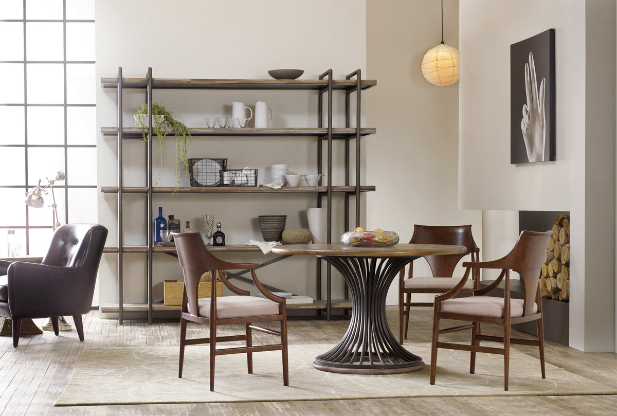 a room with a table and chairs