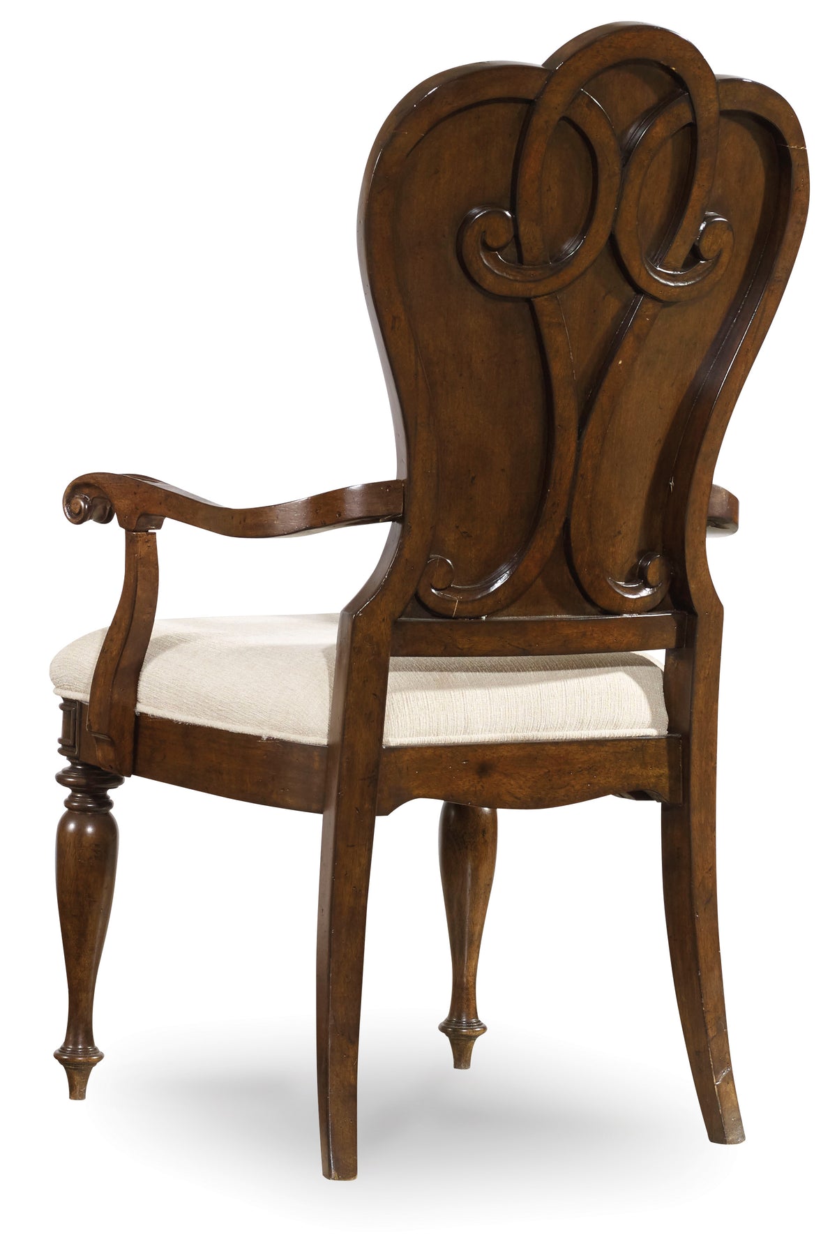 a wooden chair with a white cushion