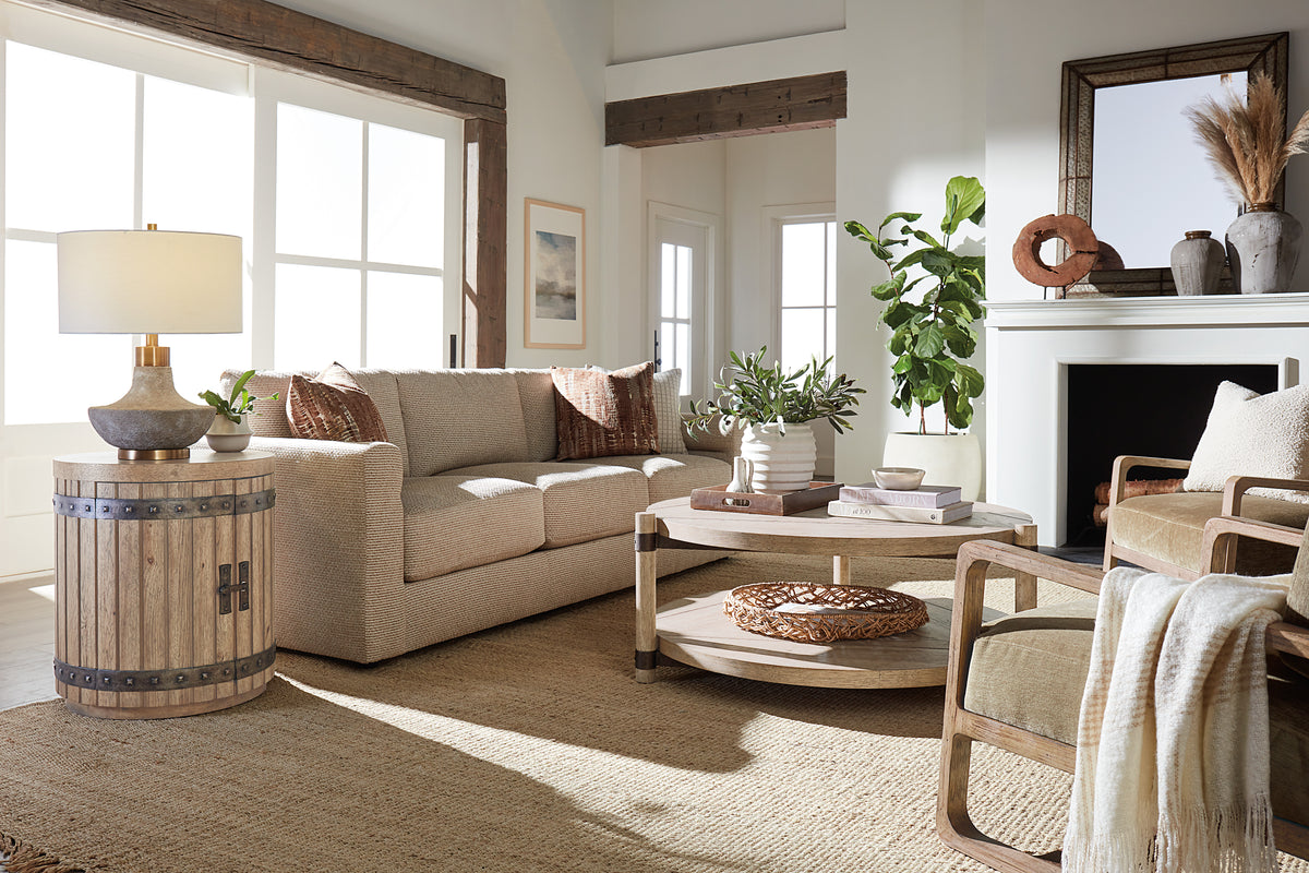 a living room with a couch and coffee table