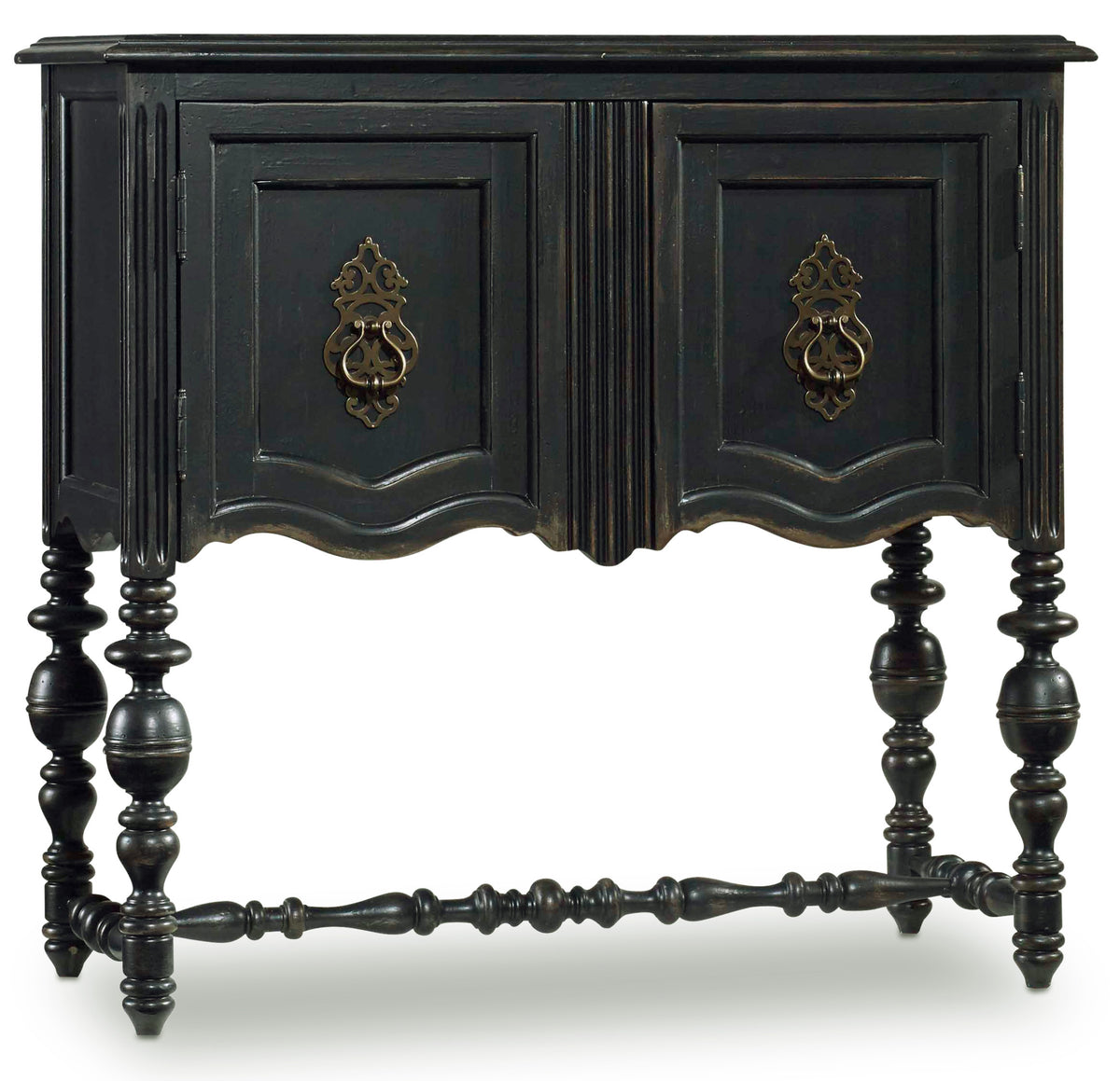 a black wooden cabinet with gold handles