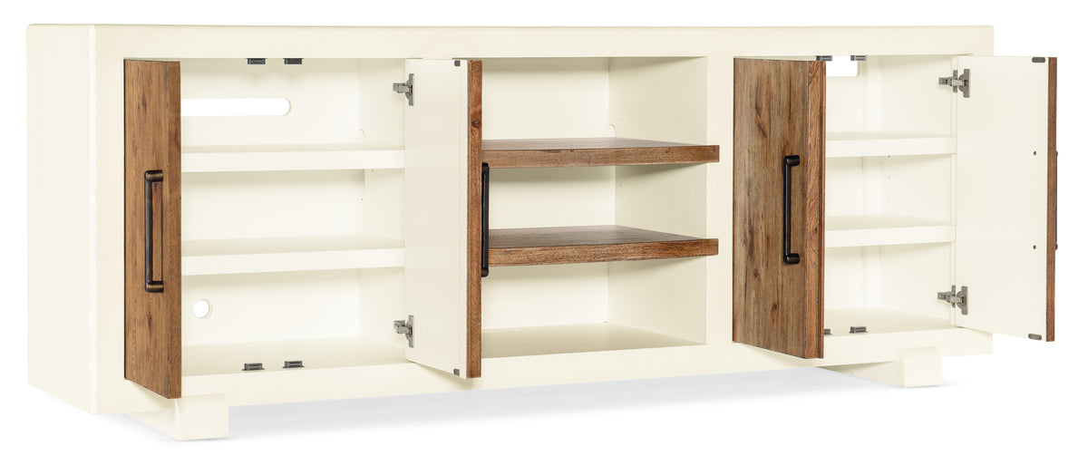 a white cabinet with open shelves