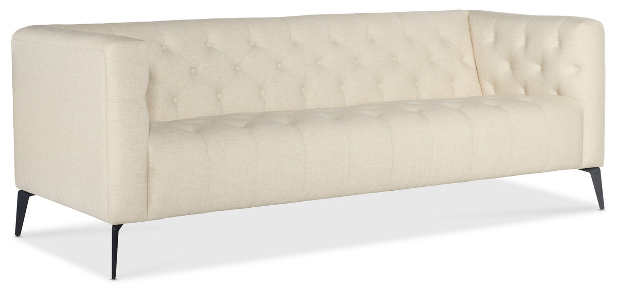 a white couch with a long arm rest