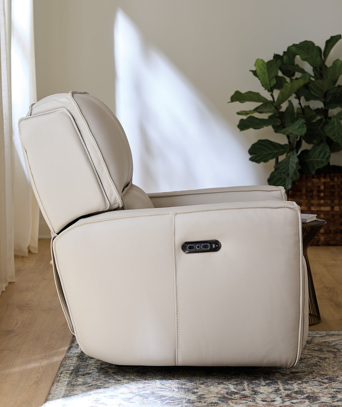a white recliner chair in a room