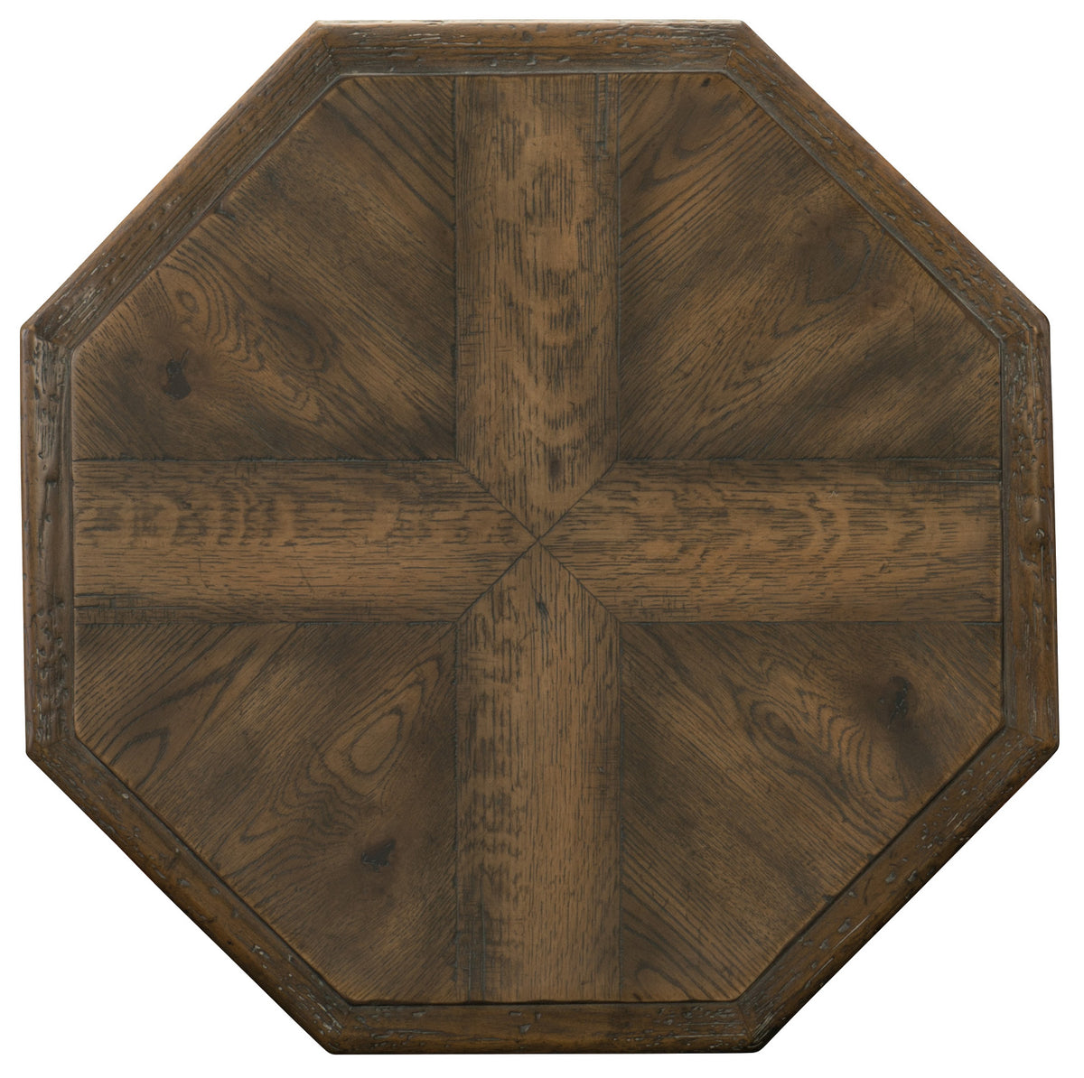 a wood table top with a cross on it