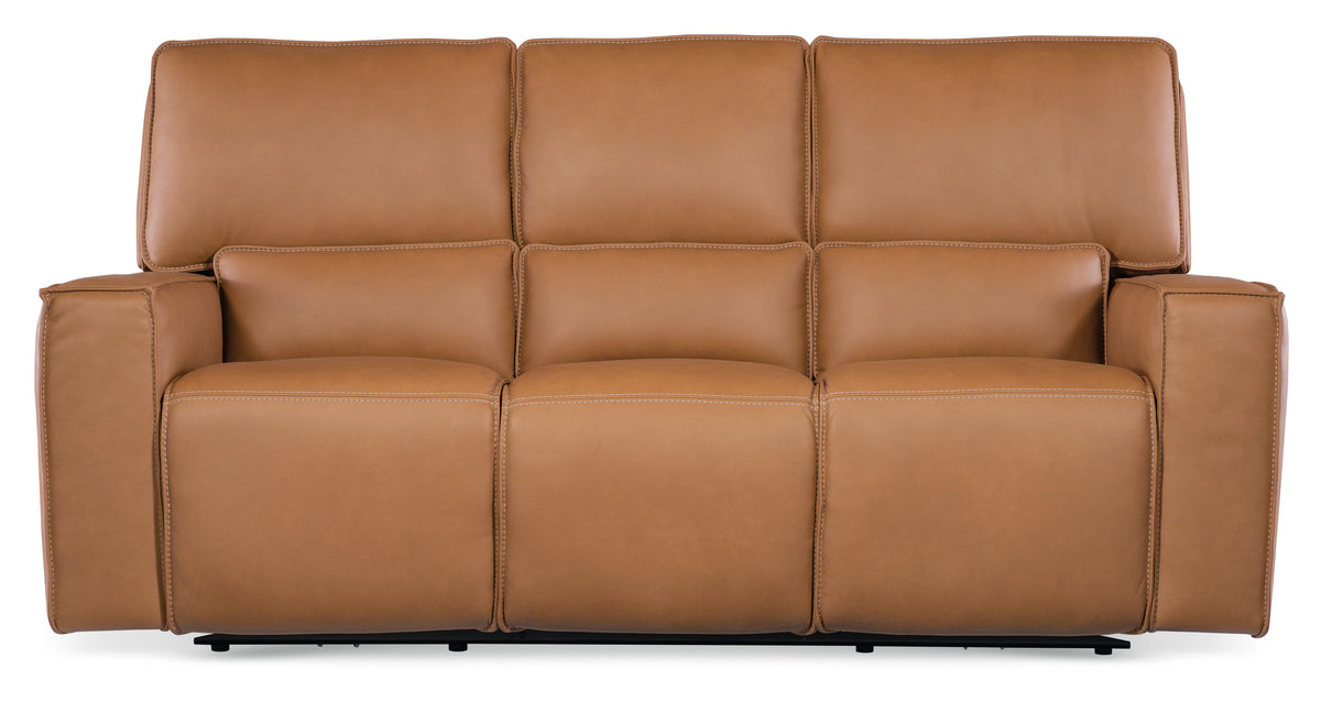a brown leather couch with black legs