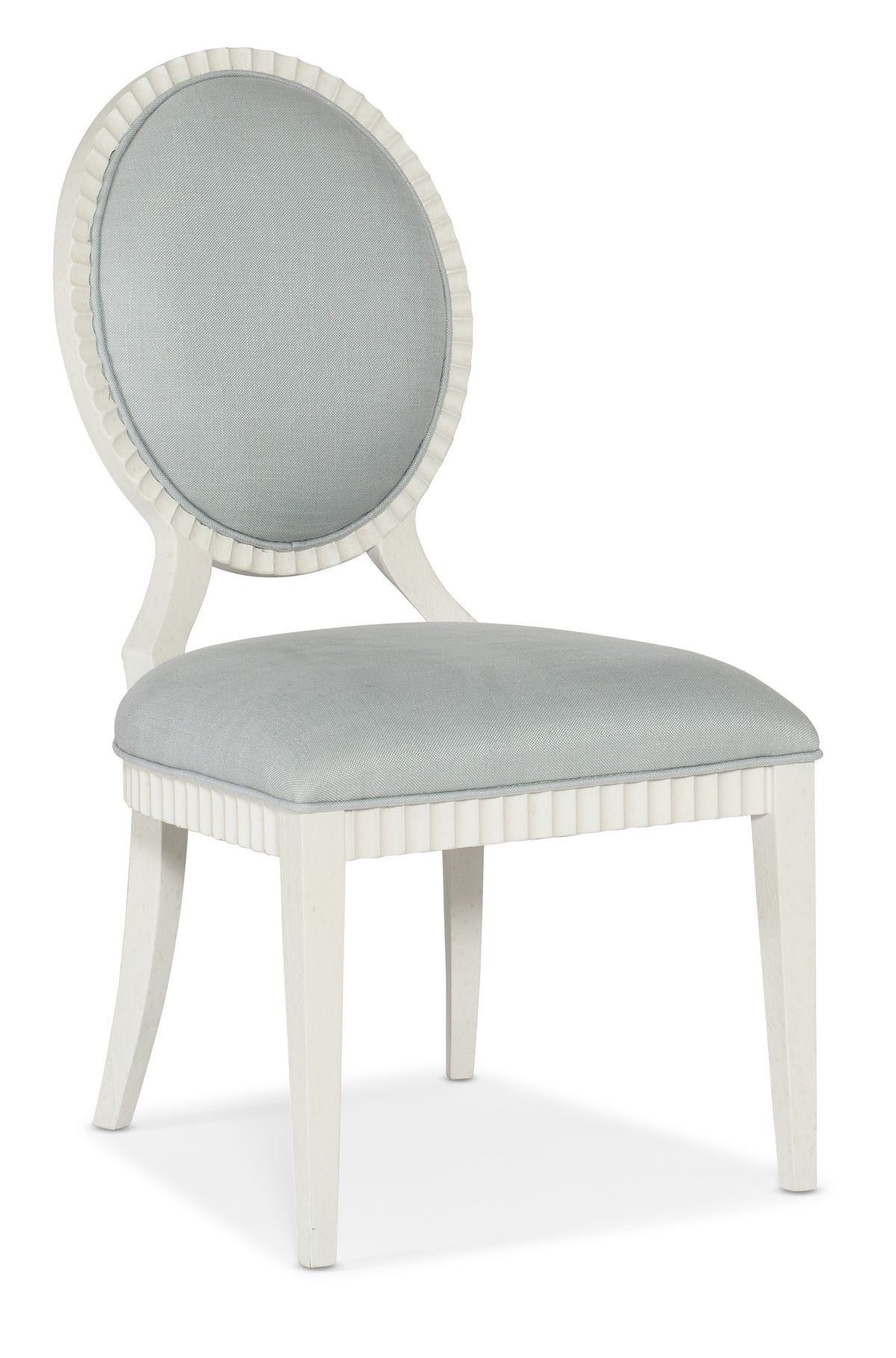 a white chair with a grey cushion
