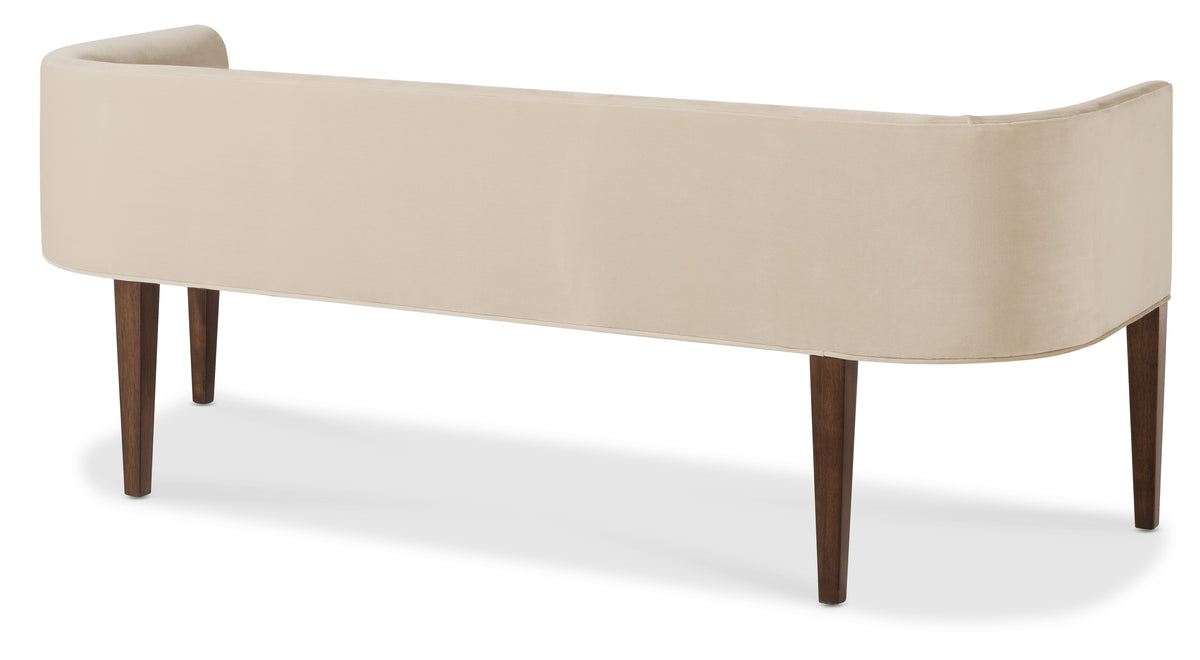 a white fabric headboard with wooden legs