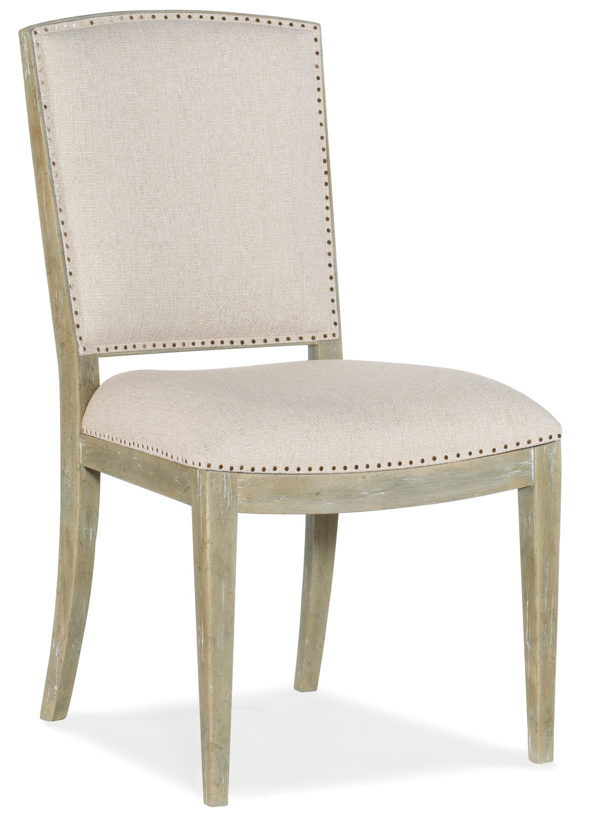 a white chair with a white cushion