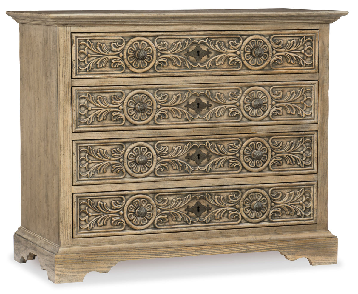 a wooden dresser with carved designs