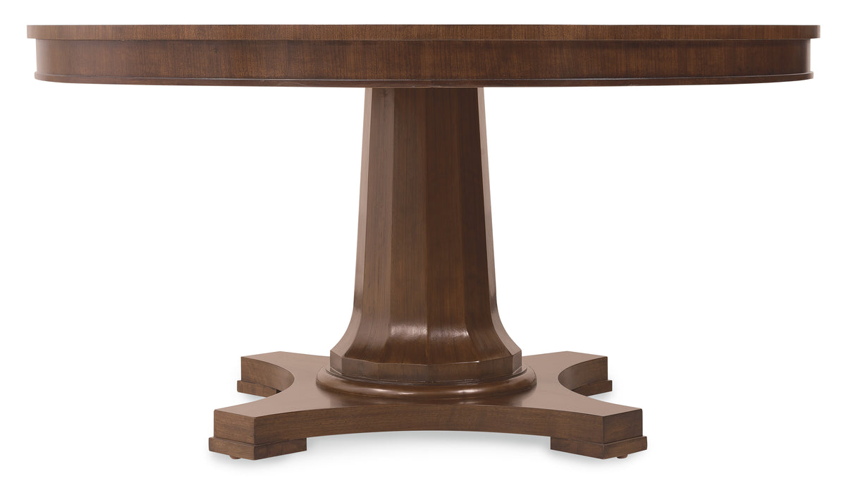 a brown wooden table with a round base