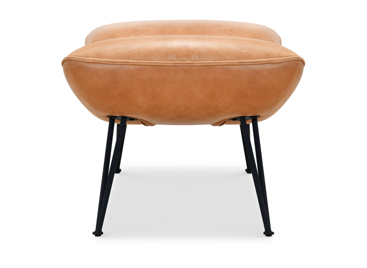 a brown leather chair with black legs