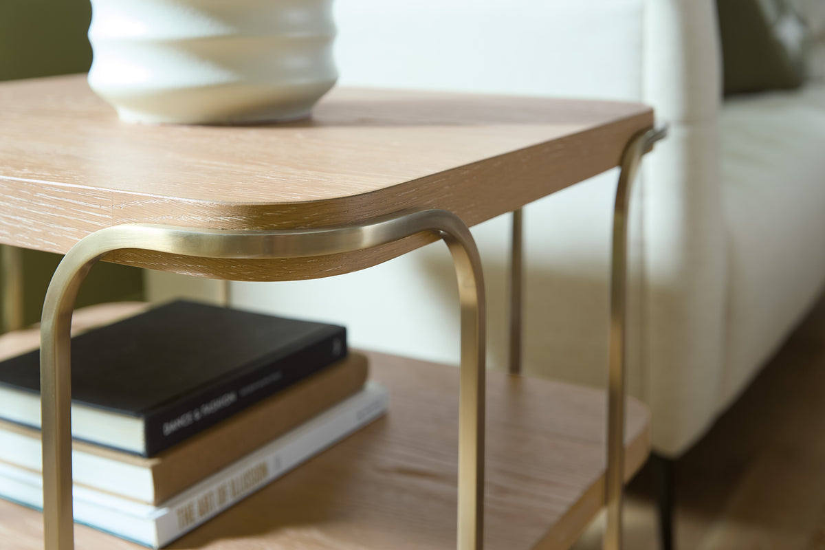 a table with a white pot on top