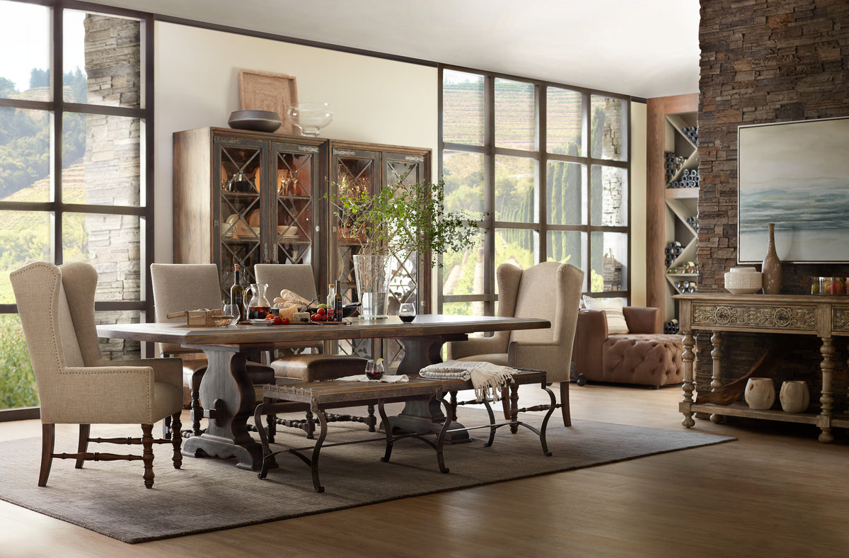 a room with a table and chairs