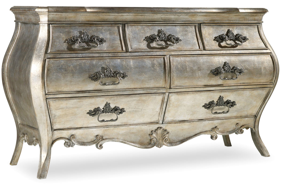 a silver dresser with drawers